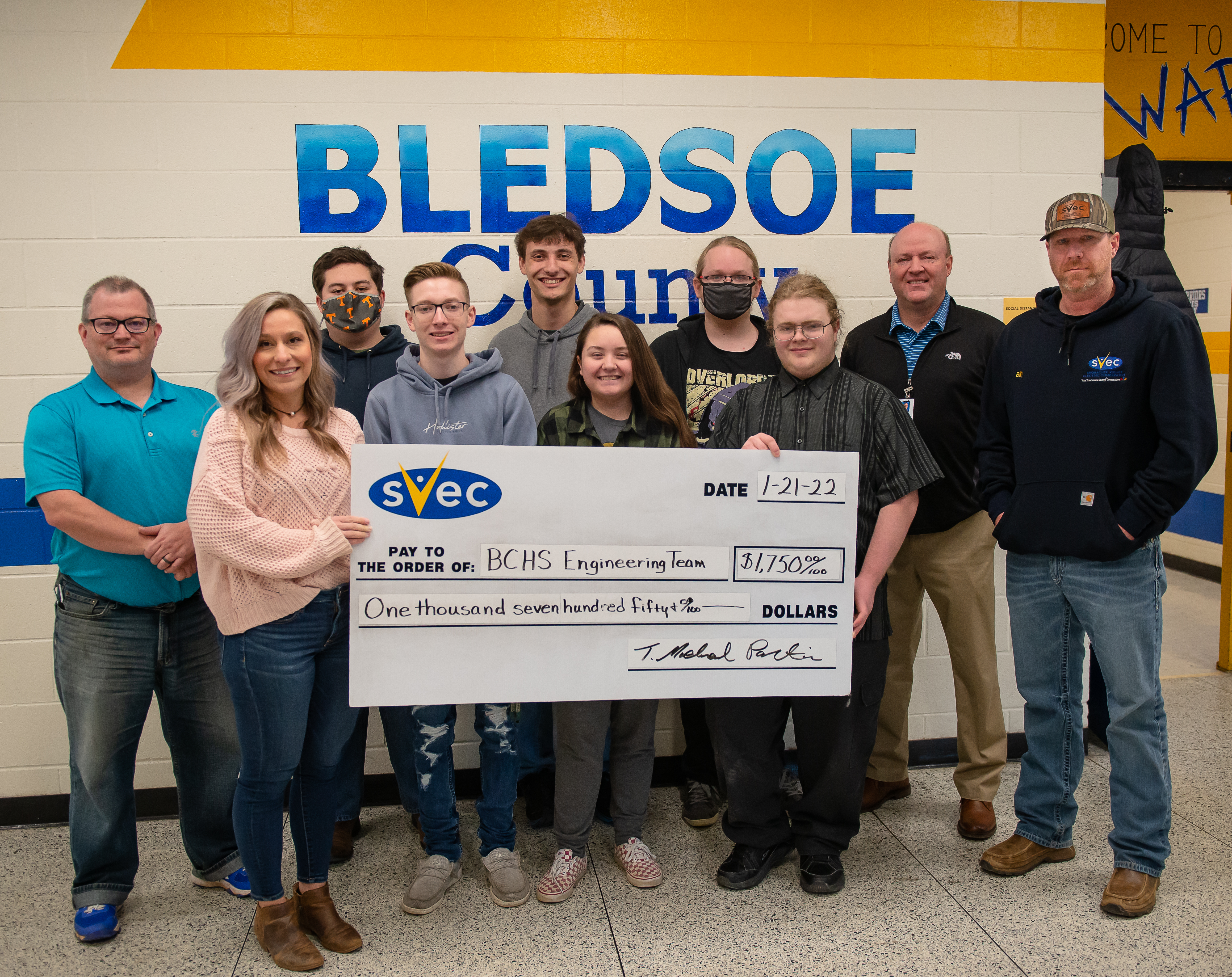 Bledsoe Engineering Team acceptiving SVEC donation for competition. 